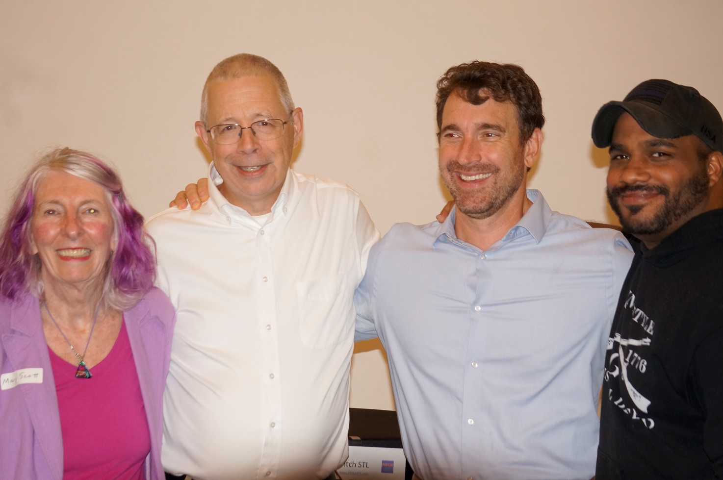 A group of people standing next to each other.